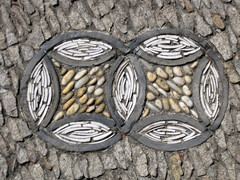 [Floor Tiles. The Curvy White Bits are Dishes]