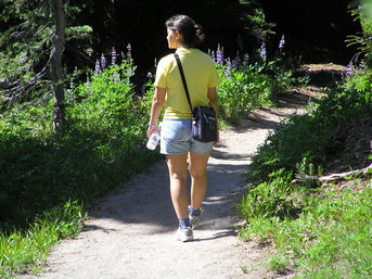 [Steph walking along the trail]