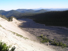 [Mt. Jefferson at the Top, Rocky Riverbed at Bottom]